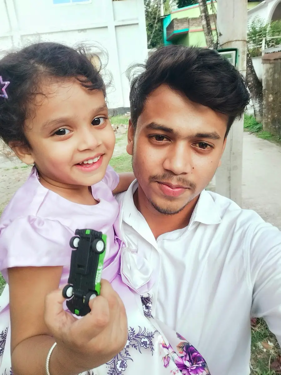 Pai e filha tiram uma selfie